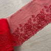 Pizzo rosso con rose metallizzate