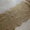 Pizzo floreale oro con frange