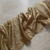 Pizzo floreale oro con frange