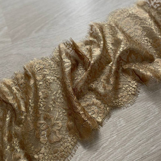 Pizzo floreale oro con frange
