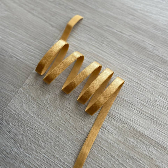 Elastico bretelle giallo scuro 12 mm