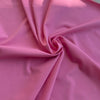 Albenga tessuto bielastico rosa per lingerie, abbigliamento sportivo e costumi da bagno a taglio libero